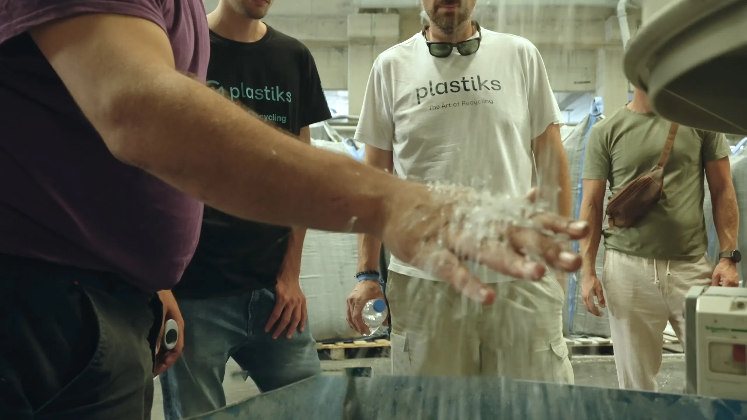 Plastiks team inspecting recovered plastic before verification